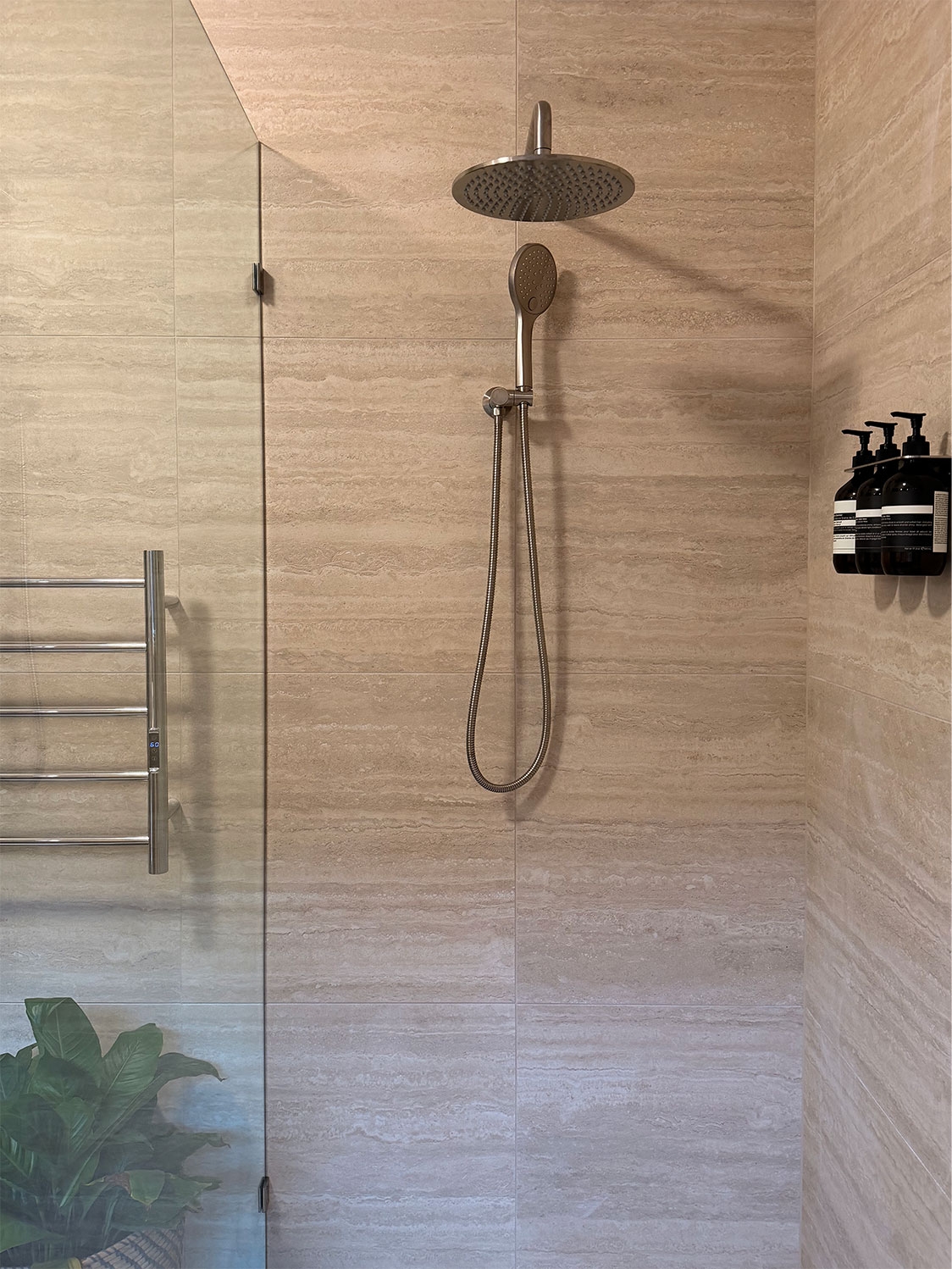 travetine tiles in a shower