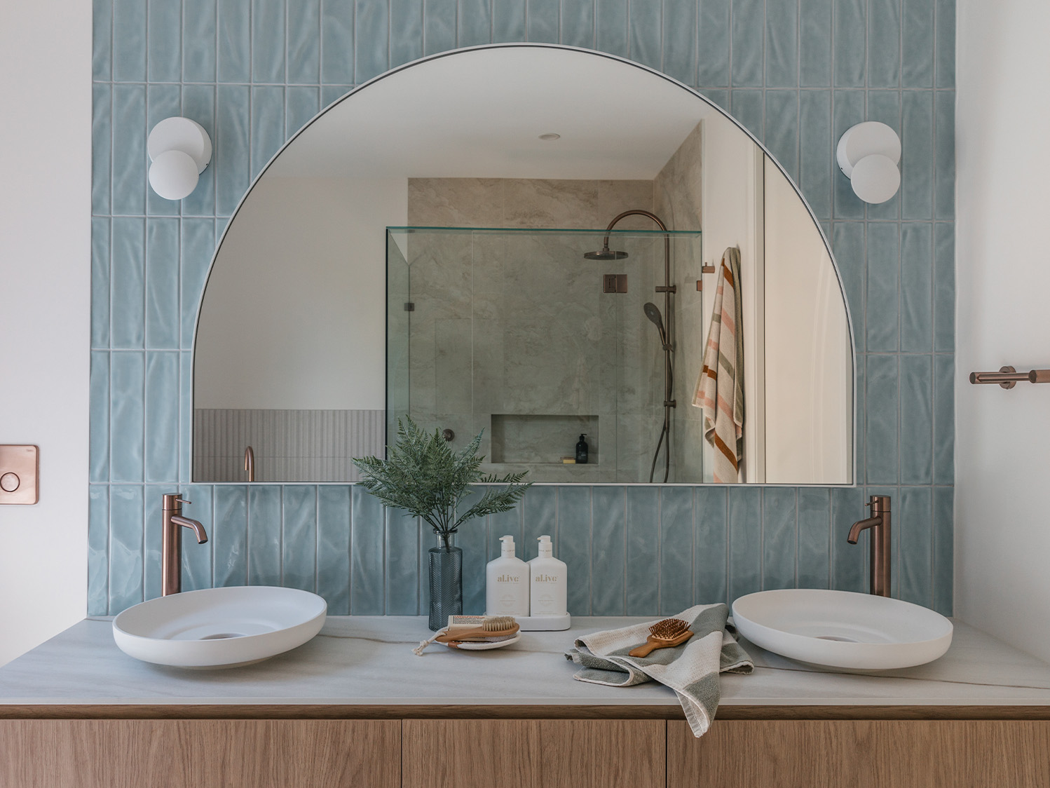 blue wavy subvway tiles on bathroom splashback