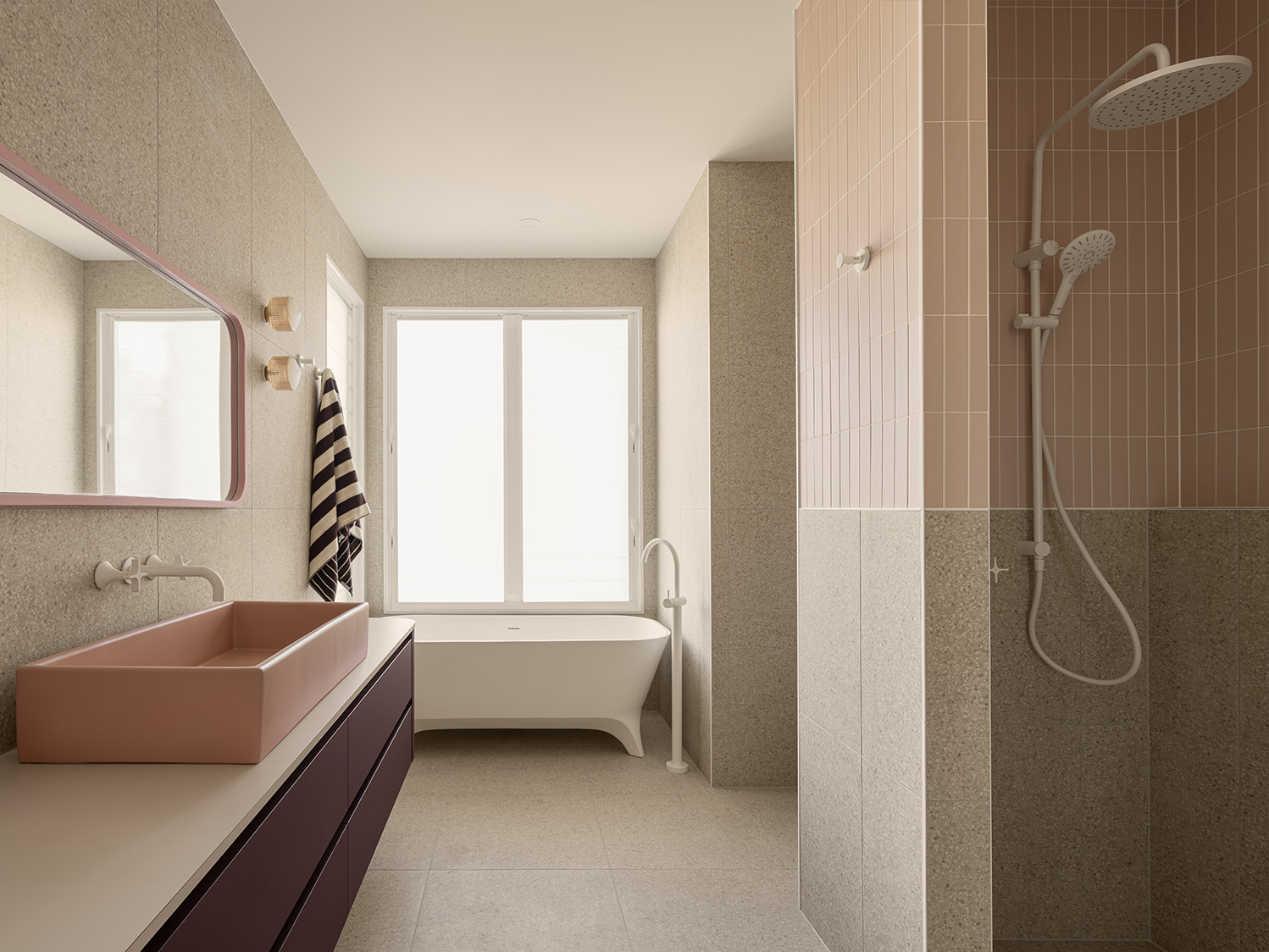 terrazzo tiles and kitkat mosaic in a bathroom