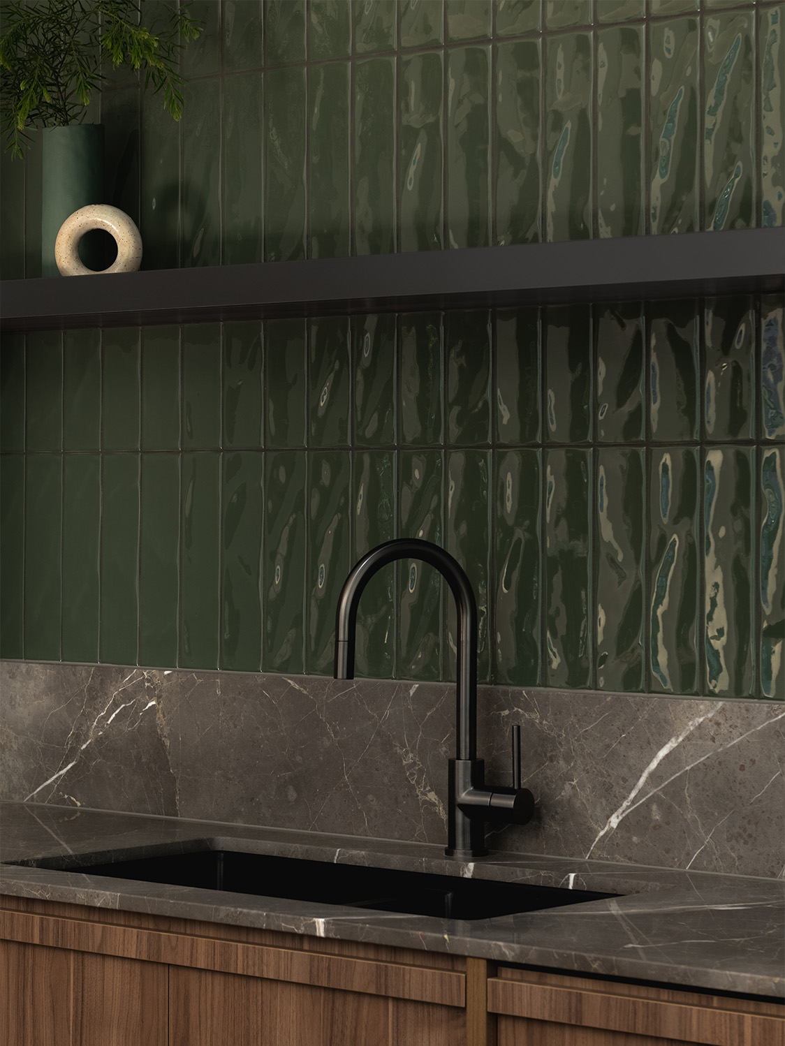 dark green subway tiles on kitchen splashback