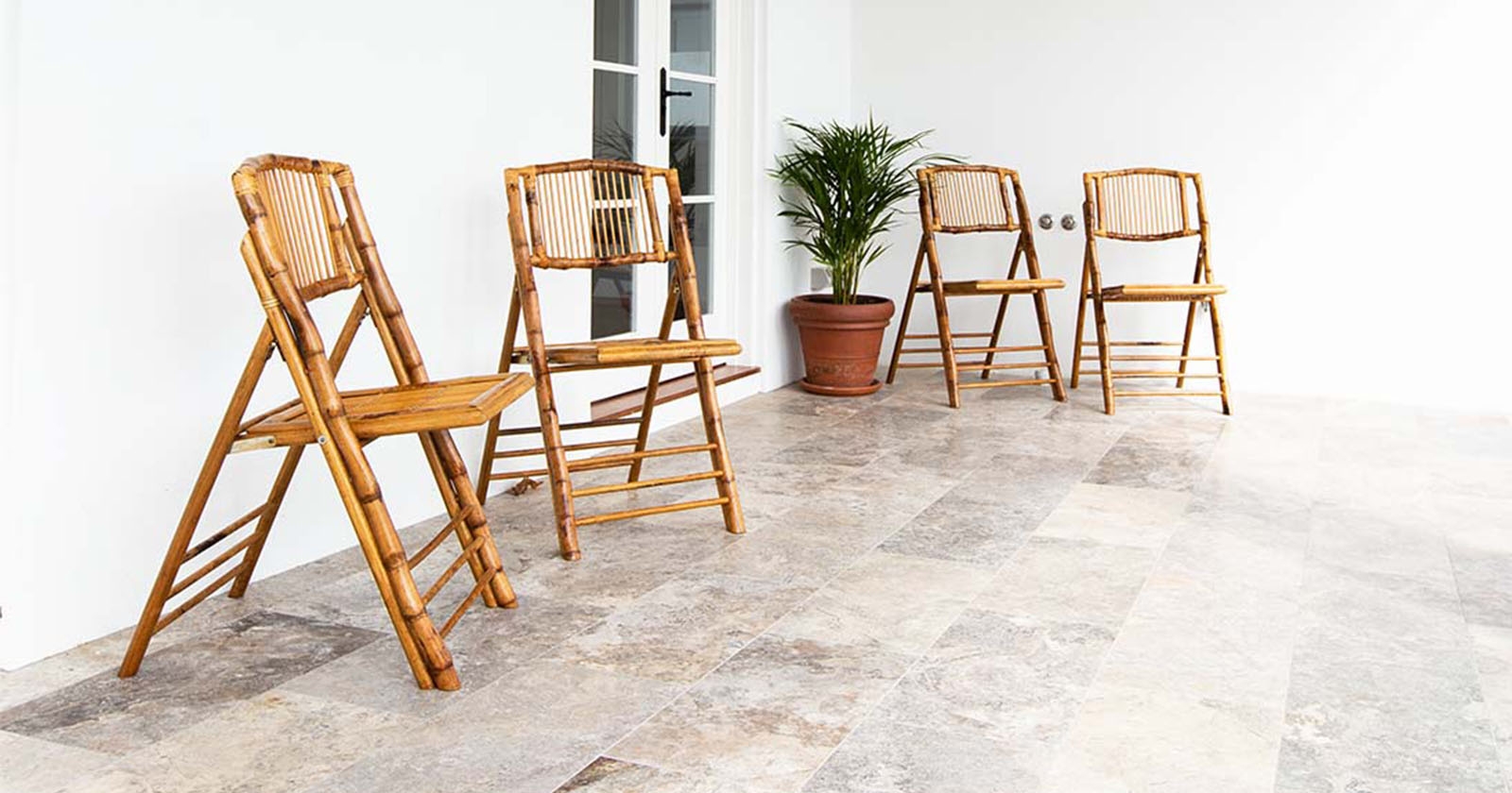 Organic layout stone tiles indoor-outdoor flow