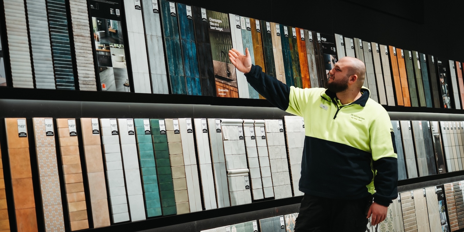 Customer being helped by a National Tiles team member in-store